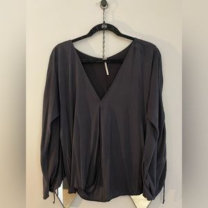 Free people women’s size Large top. Dark grey.